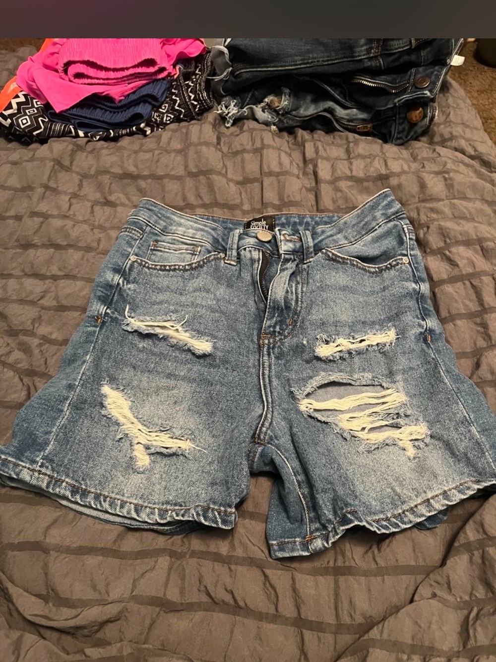 Distressed Women's Denim Shorts in Light Blue